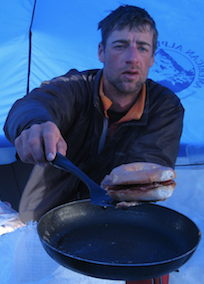 Denali Guide Cooking in Camp