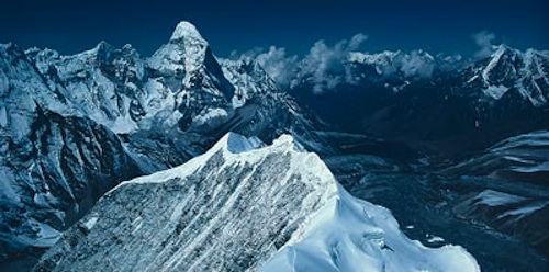 Nepal, Khumbu - South ridge of Island Peak, with the north ridge of Ama Dablam in the distance.
