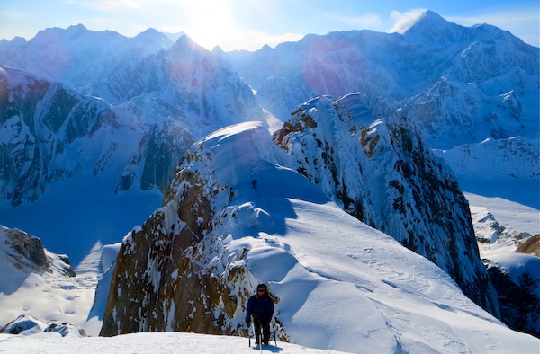 Climber gaining a ridge on the Moose's Tooth above the Ruth Gorge. Photo by Tad McCrea.