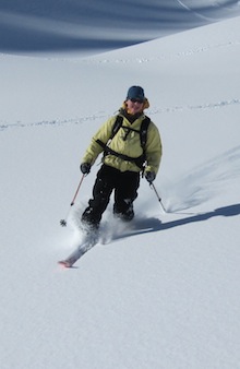 A tele-skier makes a perfect turn in the Mount Baker Backcountry.