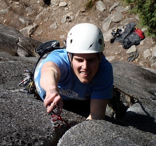 Climber placing gear on lead.