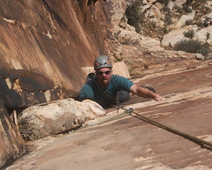 A climber on the First Ascent of Pricks and Ticks (5.9, II+).