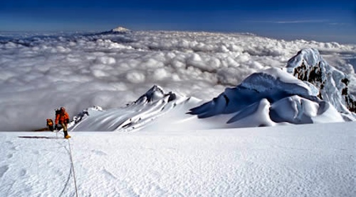 Ecuador, Nearing the summit on Antisana with Cayambe in the distance.