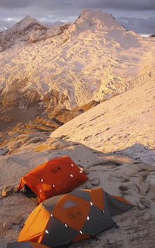 Peru, The alpenglow is spectacular at high camp on Toqllaraju.