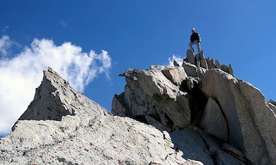 Striking a pose on the summit of Mt. Conness after climbing the wild North Ridge.