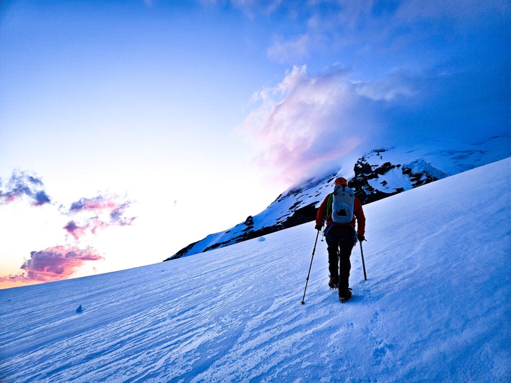 Mountaineer traveling across a glacier on Mt. Baker
