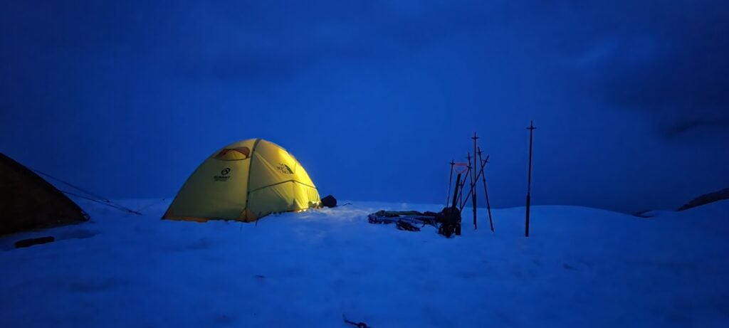 A tent sits on top of a North Cascades winter scene during an Alpine Institute course