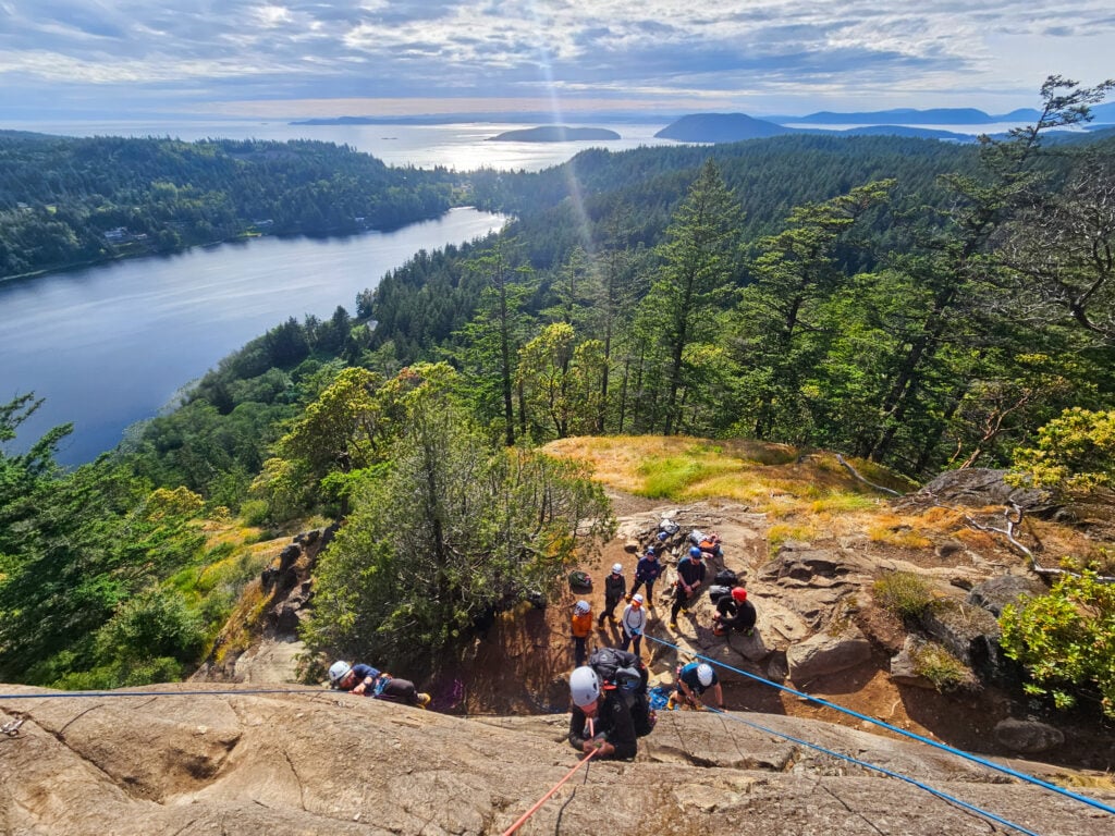 Students rock climbing at Mt. Erie.