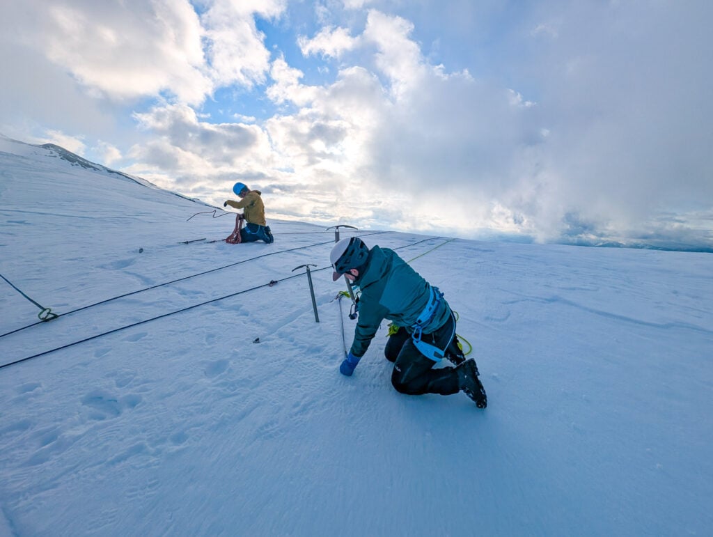 Students set up a crevasse rescue anchor system