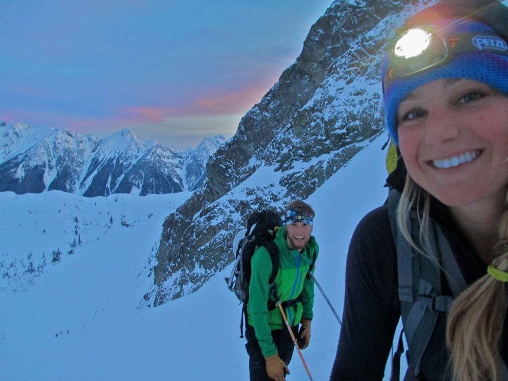 Early morning smiles on the ascent of Mt. Baker during a ski and splitboard course of the American Alpine Institute