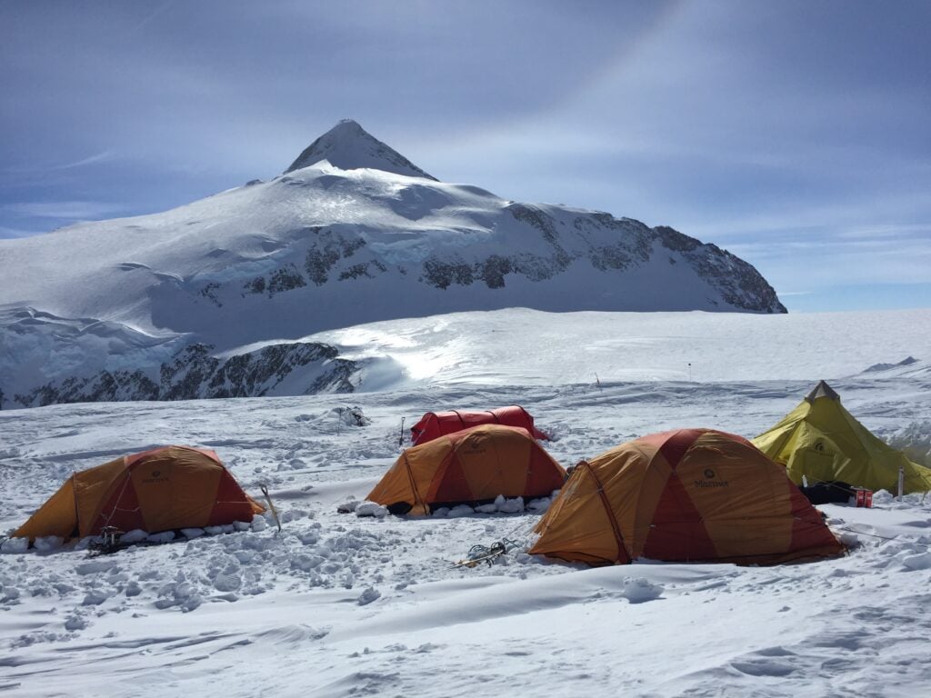 Vinson High Camp, Mt Shin behind Guy Cotter