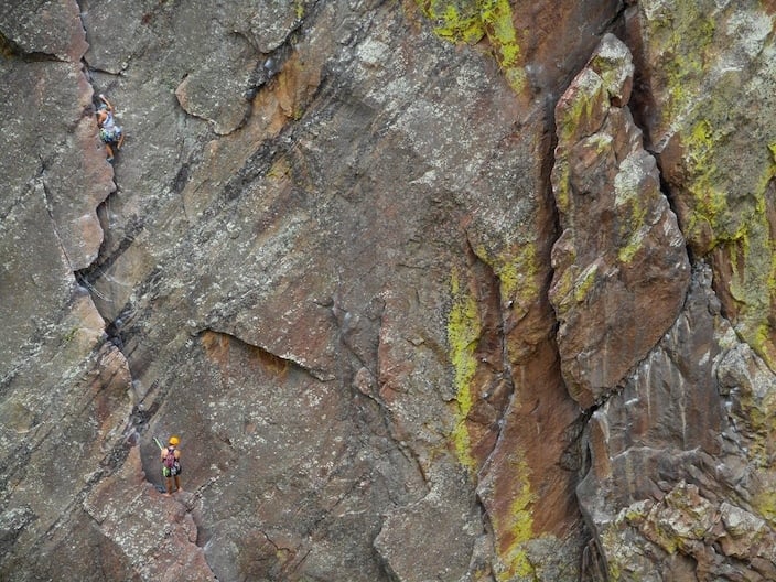 A climber leads the second pitch of the Bastille Crack (5.7) in Eldorado Canyon.