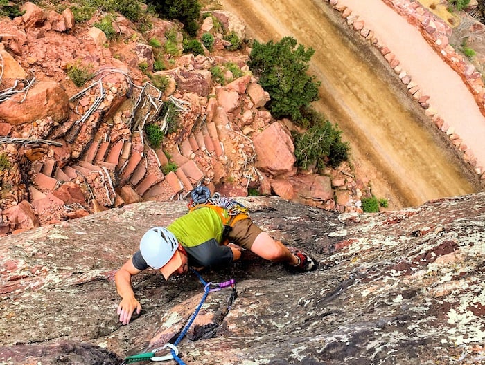 Climber ascending Lemmings on Wind Tower in Eldorado Canyon above South Boulder Creek. Alejandra Garcés Pozo.