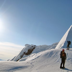 Climbers on the summit ridge of an unnammed peak