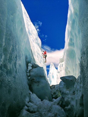 Descending past massive seracs on the Coleman Glacier