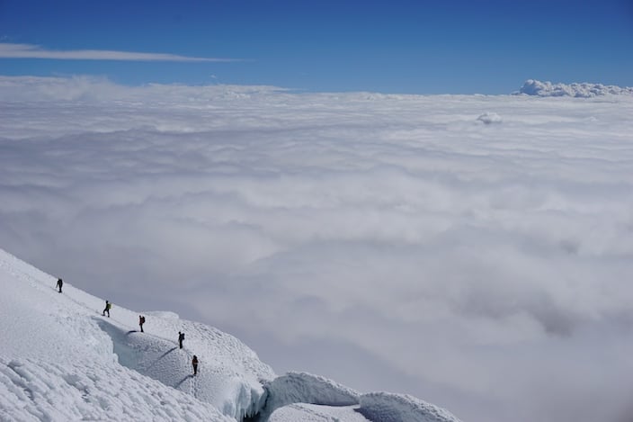 Climbers in the clouds on Cotopaxi