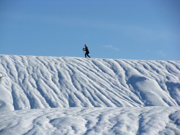 Snowshoeing along a high ridgeline