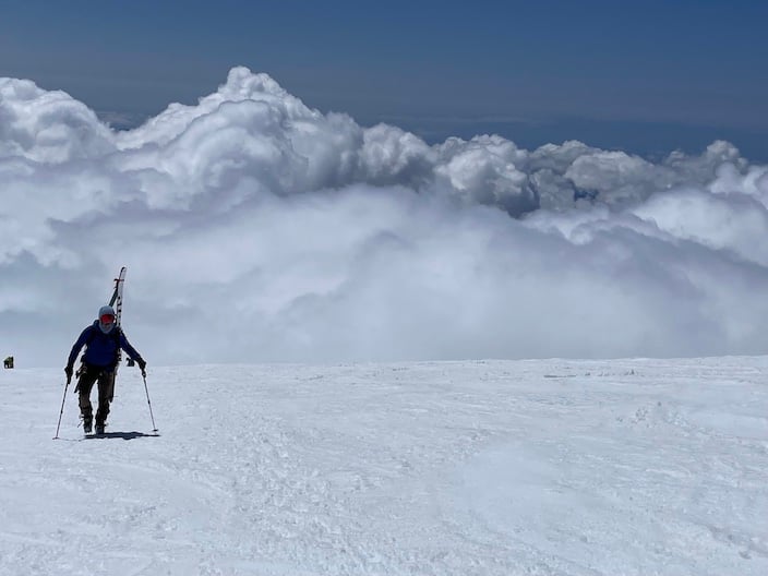 Skier Above Clouds