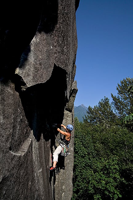 Climbing bullet-proof granite at Index