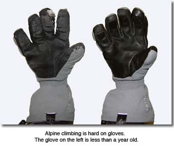 Alpine climbing gloves with heavy wear and tear
