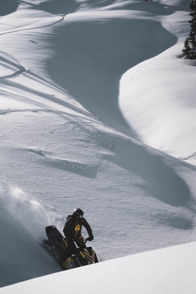 Snowmobiling the rolling hills