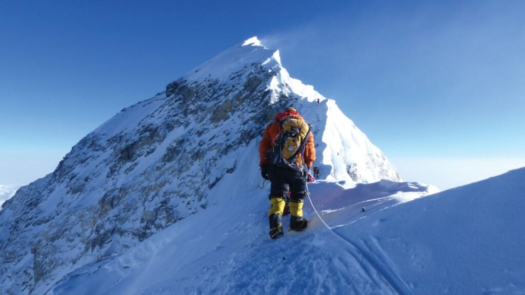 The Seven Summits 8 everest summit ridge climber high altitude mountaineering