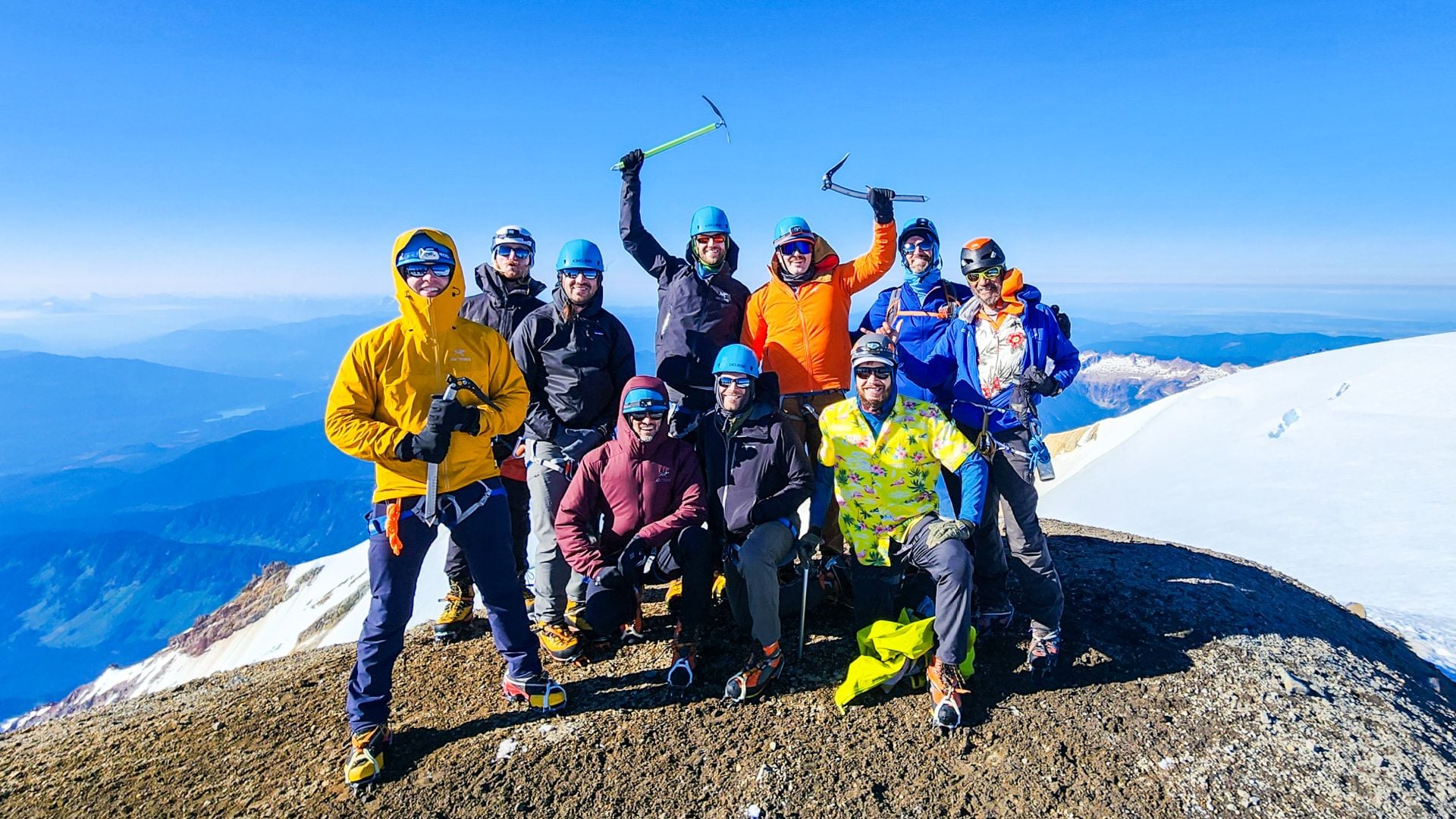 mountaineering summit group photo