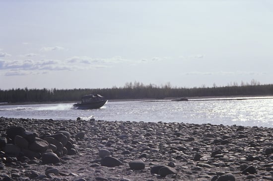 After a Denali expedition, climbers can hang around and take a boat ride or tour the Park for a nice wind-down after being on the mountain for nearly a month. Here a jetboat cruises up the Talkeetna River after a day out.