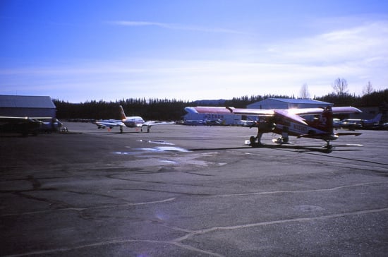 A K2 Beaver prepares to taxi onto the main landing strip behind a Piper Navajo.