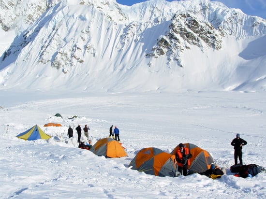 Denali Base Camp 18 Climbers hastily pitch tents for the brief stay at Base Camp before heading onto Denali.