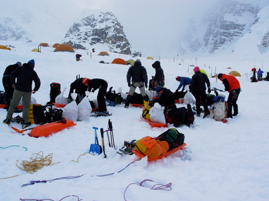 Denali Base Camp 21 A group preparing to leave Base Camp and make a single carry to Camp 1.