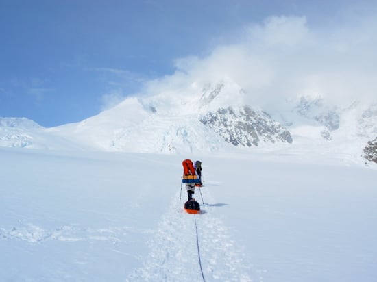 Lower Kahiltna Glacier 16 Approaching Camp 1 with Ski Hill in the distance and the Northeast Fork of the Kahiltna to the climbers' right.