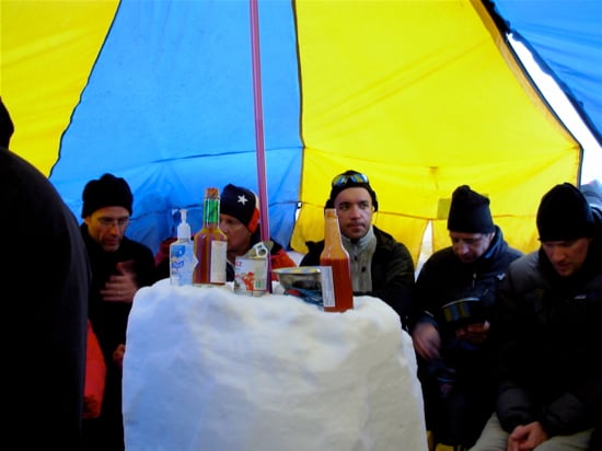 Denali Base Camp 14 Cooktent life. An AAI group is introduced to the joy of the cooktent at Base Camp.