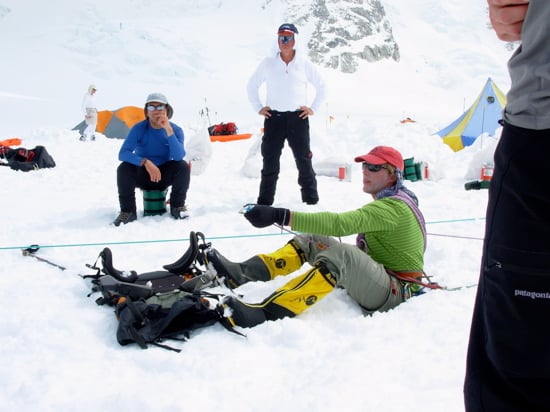 Climbers participate in a crevasse rescue demonstration.