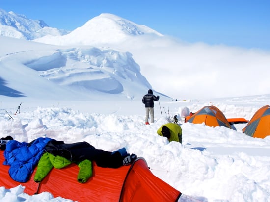 Climber Goran Matic at the edge of Camp 2 with the Kahiltna Dome behind.