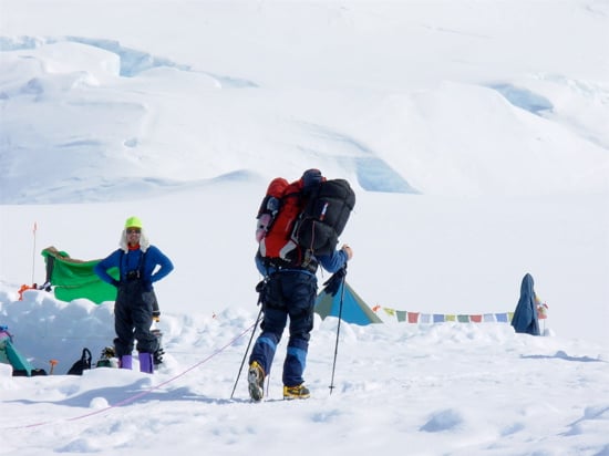 A heavily-laden climber passing through Camp 2.