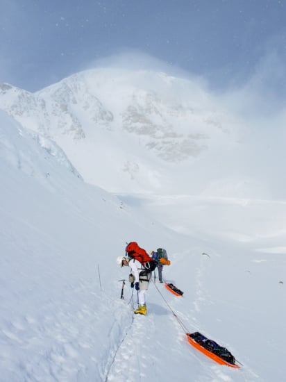A climber passes fixed protection at Windy Corner.