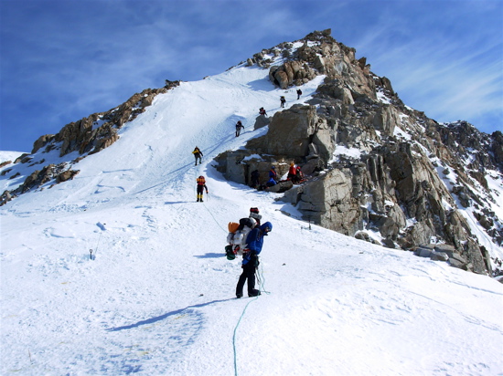 The Fixed Lines and the Ridge to High Camp 26 Climbers on the ridge at 16,500 feet approaching Washburn's Thumb.
