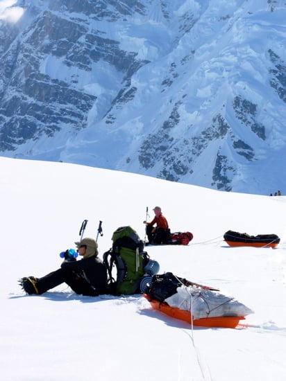 Lower Kahiltna Glacier 25 Mount Hunter looms above resting climbers just below Base Camp.