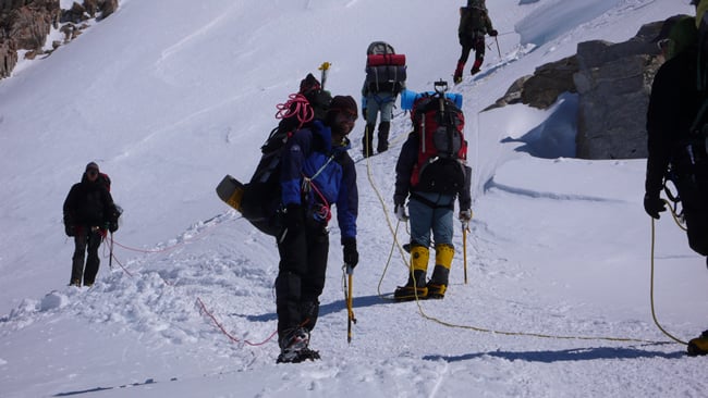 The Fixed Lines and the Ridge to High Camp 30 AAI guide Joey Elton leads a team back towards the top of the fixed lines.