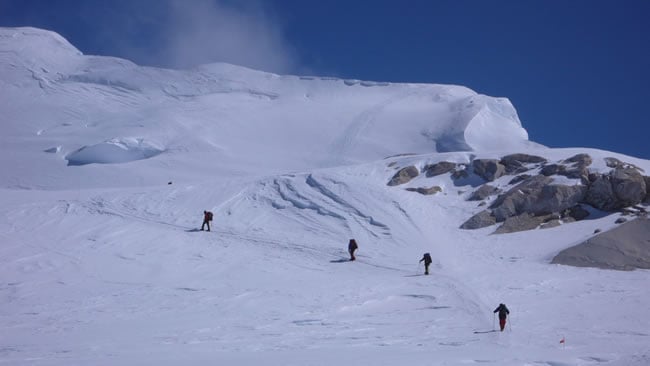 Climbers nearing the Football Field with Pig Hill in the distance.