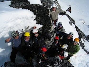 Climbers celebrate a group summit in Alaska.