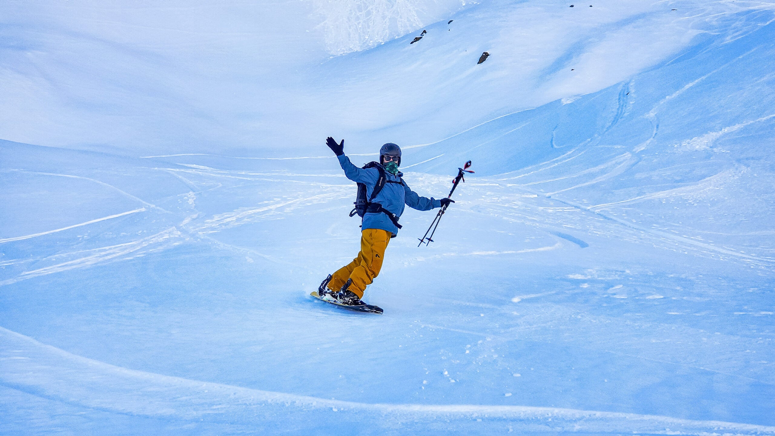 A splitboarder revels in the hard-earned turns in the Mt. Baker Backcountry during an American Alpine Institute splitboard course