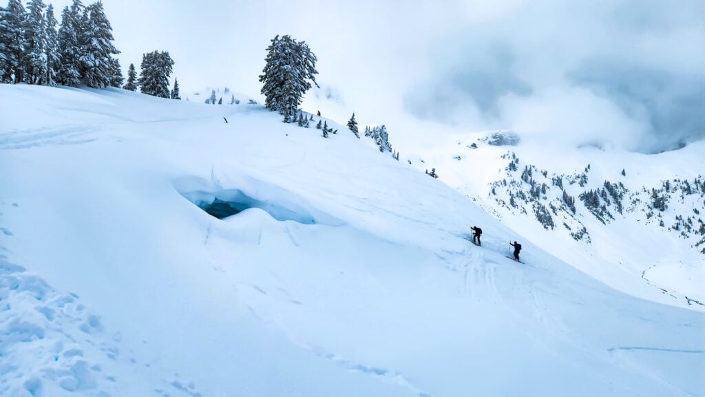 American Alpine Institute AIARE Avalanche students skin up a slop in the Mt. Baker Backcountry in Washington