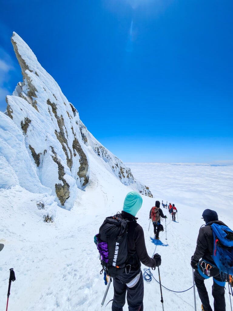 Climbers on a rope team descending the south side of Mt. Baker