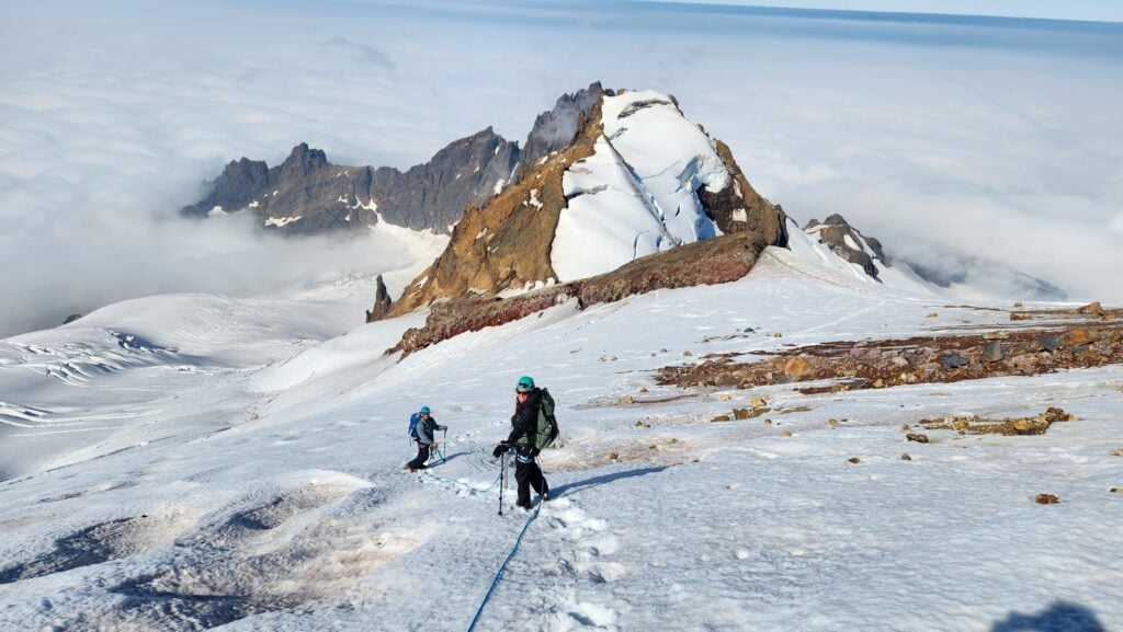 Climbers descend after a summit of Mt. Baker