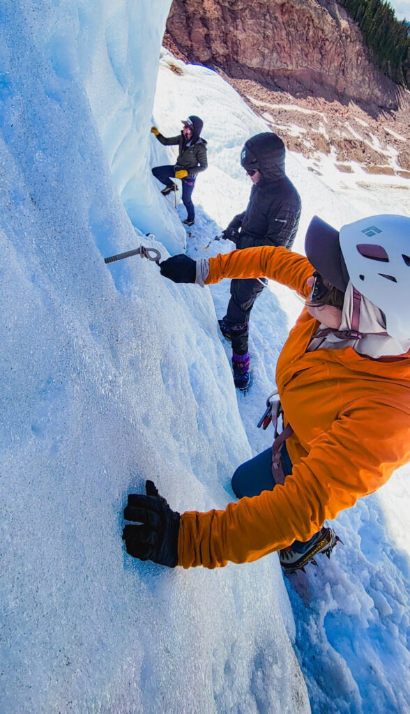 Students practice making v-threads and building ice anchors in the lower seracs of Mt. Baker's Coleman glacier