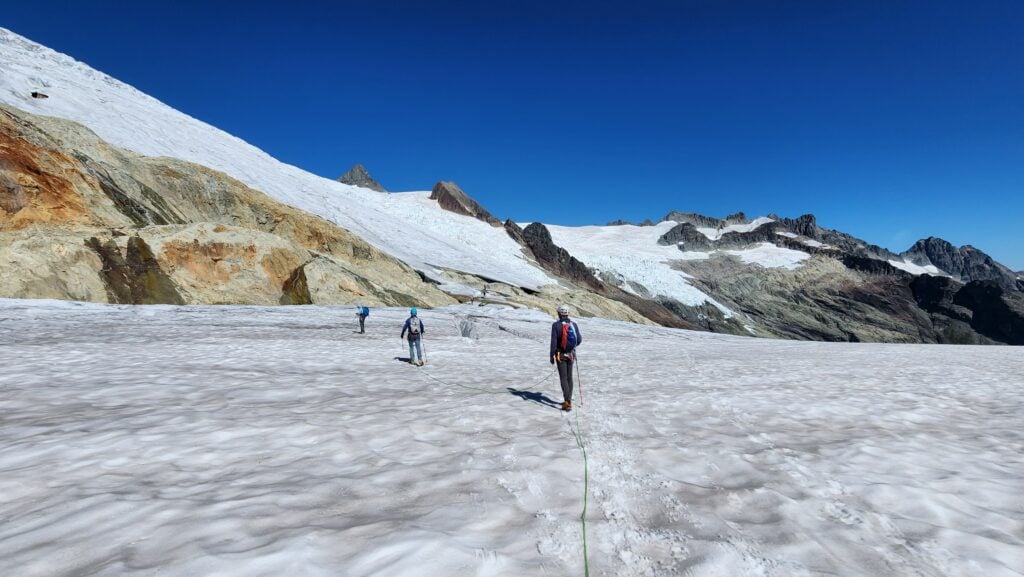 A team of students navigate the Lower Sulphide Glacier on Mt. Shuksan