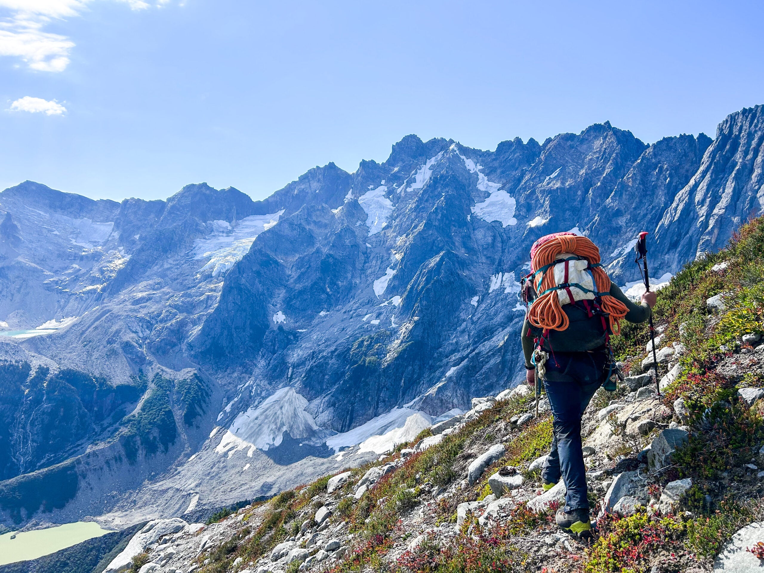A climber hikes to the next camp on their expedition in the remote alpine wilderness of the North Cascades during American Alpine Institute Alpine Mountaineering and Technical Leadership Part 4 (AMTL4)