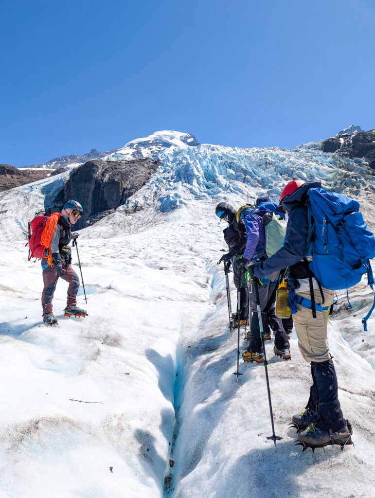 Students learn about glaciology and how to navigate in glaciated terrain on an American Alpine Institute Leaders of Tomorrow Summit Camp on Mt. Baker